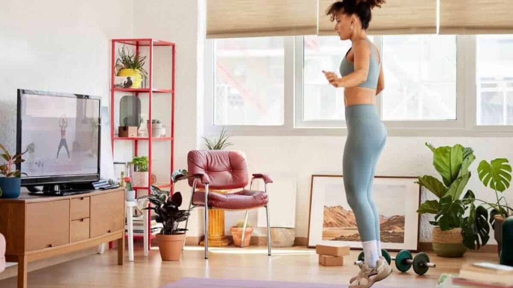 Busy mom doing a home workout at home