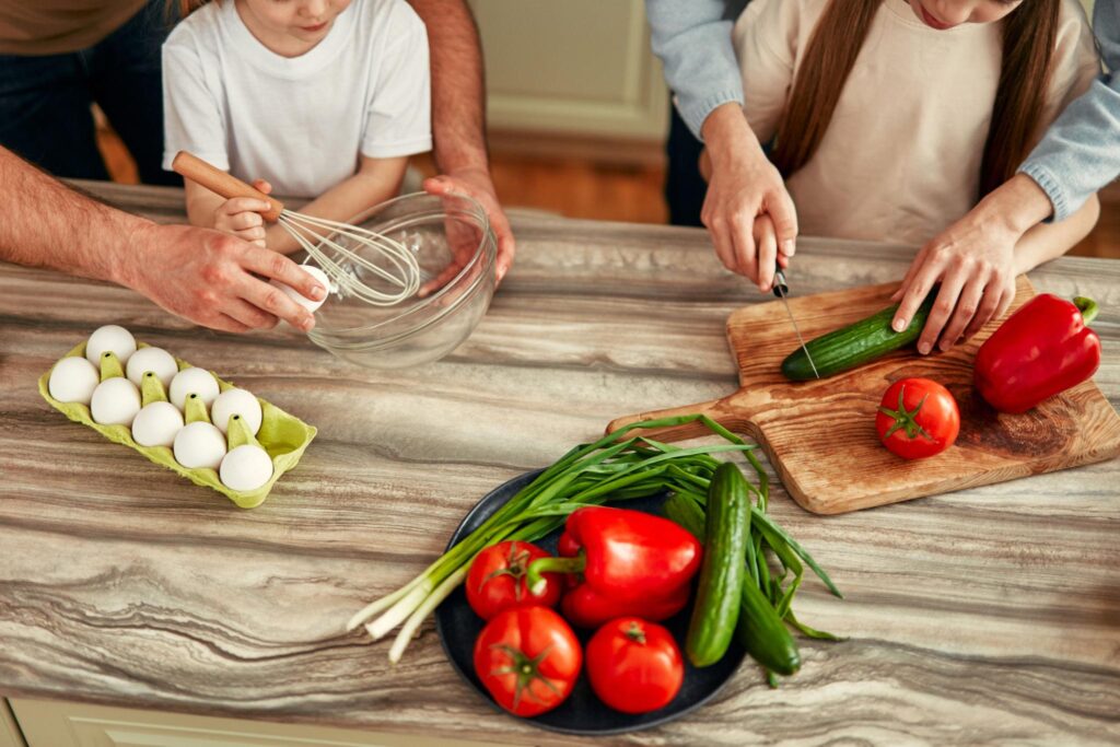 
Family enjoys cooking together in the kitchen with fresh vegetables and ingredients
Family members cooking together in a vibrant and modern kitchen environment can be fun
We make the best team in the kitchen
Happy family cooking together at home
Family enjoys cooking together in the kitchen with fresh vegetables and ingredients