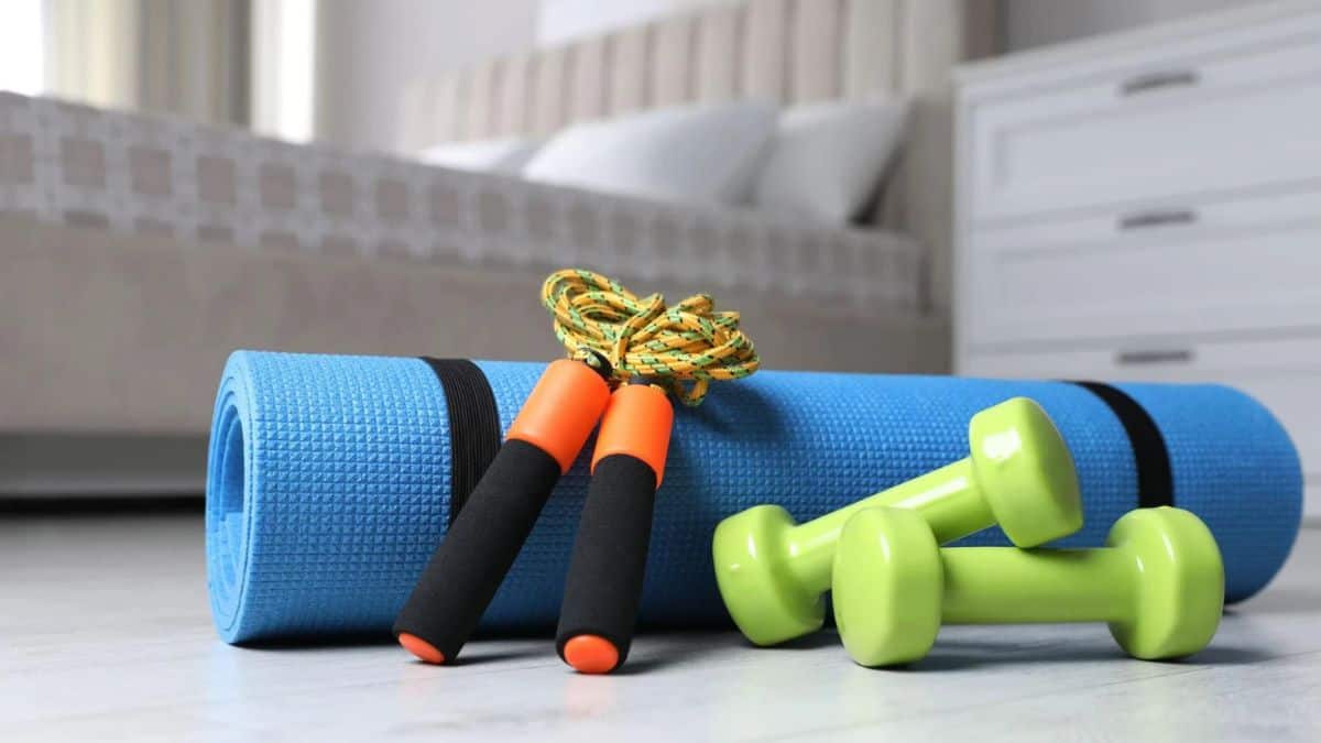 Home workout equipment in a small living room for busy moms staying active at home